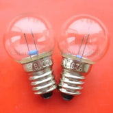 Pair of 8V 0.7A miniature E10S base light bulbs with 18mm diameter